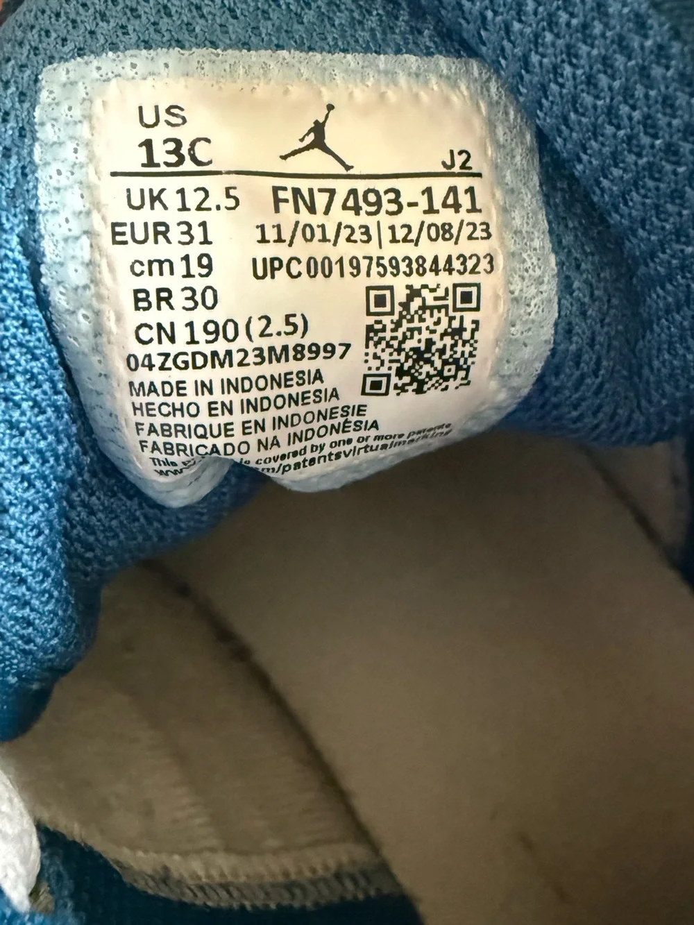 Air Jordan 1 Mid White and Navy Sneakers